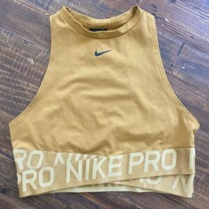 Nike Pro Sports Bra High Neck Gold Size M
Great condition
Mesh back
Size Medium